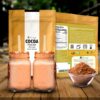 Raw and Natural cocoa powder from bolmay cocoa package with two bottles of cocoa drinks and a cup of cocoa powder from Bolmay cocoa front package with cocoa beans. unsweetened cacao powder,,natural cacao powder, raw cacao goodness,
