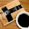 Bolmay cocoa Special black cocoa powder Ultra Dutch processed from Bolmay cocoa front package with and white cup of cocoa powder