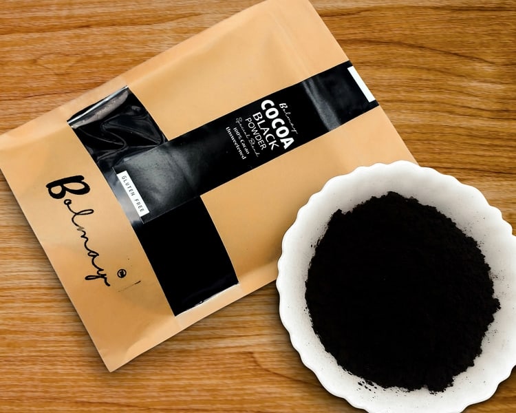 Bolmay cocoa Special black cocoa powder Ultra Dutch processed from Bolmay cocoa front package with and white cup of cocoa powder