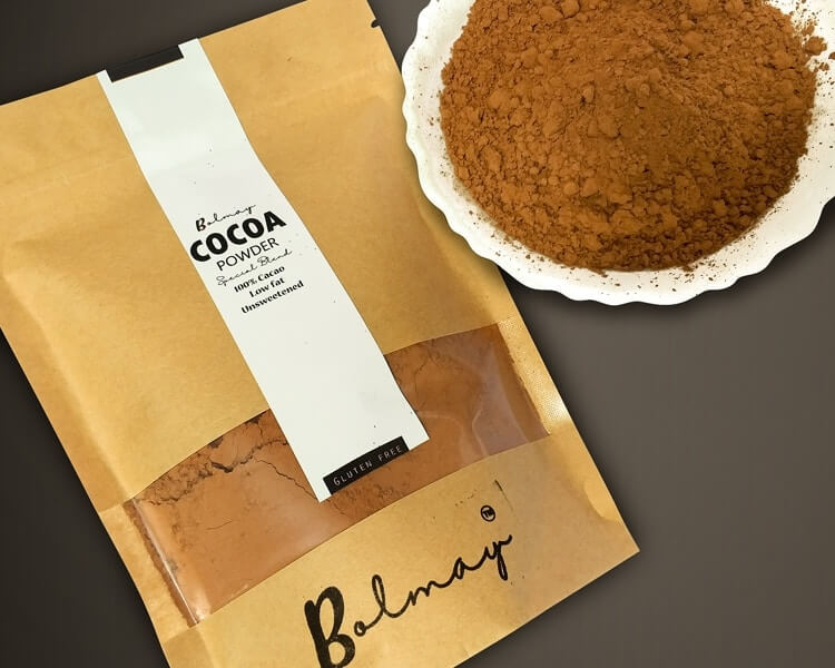 bolmay_low_fat_cacao_powder_pic Bolmay cocoa low fat cocoa powder dutch processed from Bolmay cocoa front package with and white cup of cocoa powder